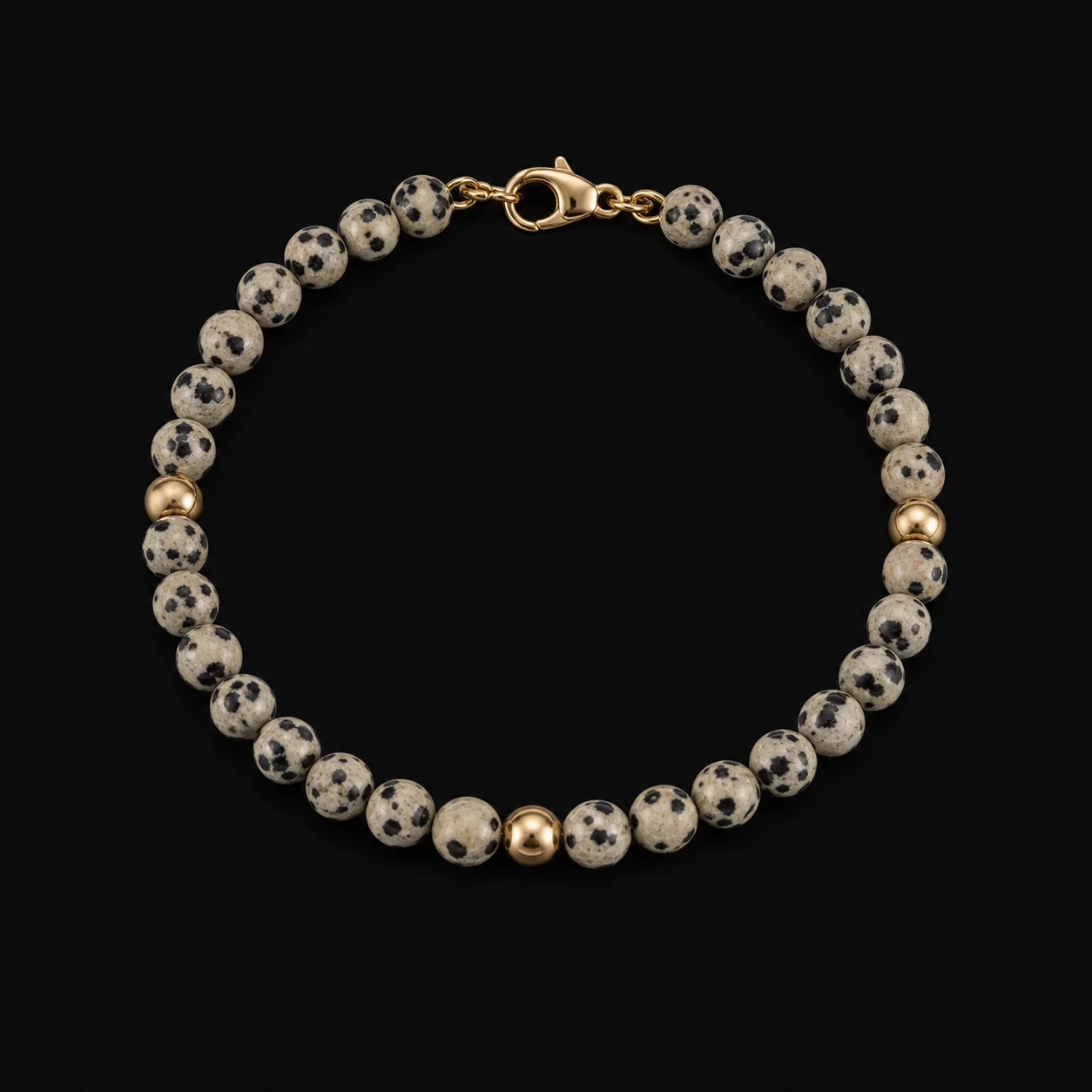 Finished dalmatian jasper bracelet with gold components
